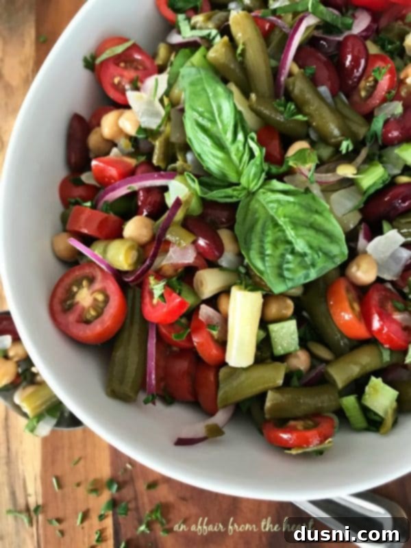Vibrant Italian Bean Salad 3 Close-up of freshly chopped vegetables and herbs for Italian Bean Salad