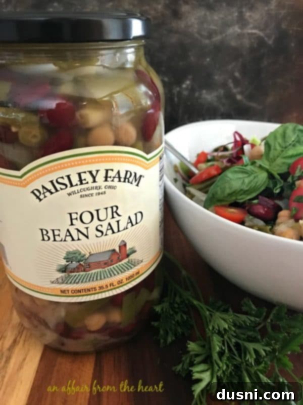 Vibrant Italian Bean Salad 9 Close-up of a spoon scooping Italian Bean Salad