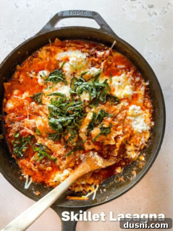 Overhead view of a cooked skillet lasagna ready to be served