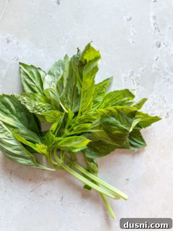 Close-up of diced tomatoes and ground beef in a skillet