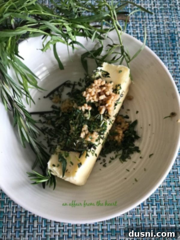 Gourmet Herb Butter Filet Mignon 7 A block of homemade herb butter, rich with fresh tarragon and rosemary.