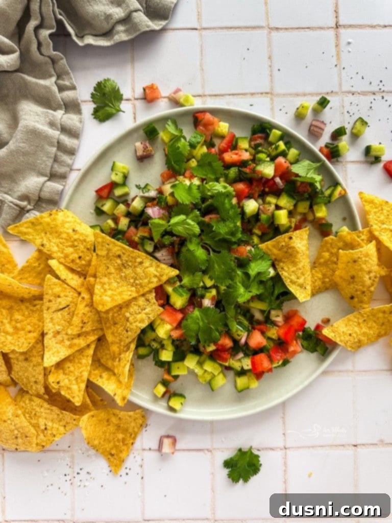Close-up of vibrant cucumber salsa ingredients.