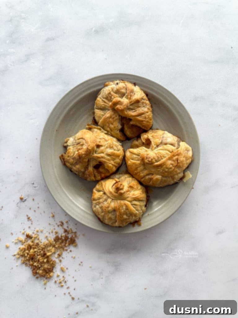 Apple Dumplings with Spiced Rum Caramel Sauce on a Plate