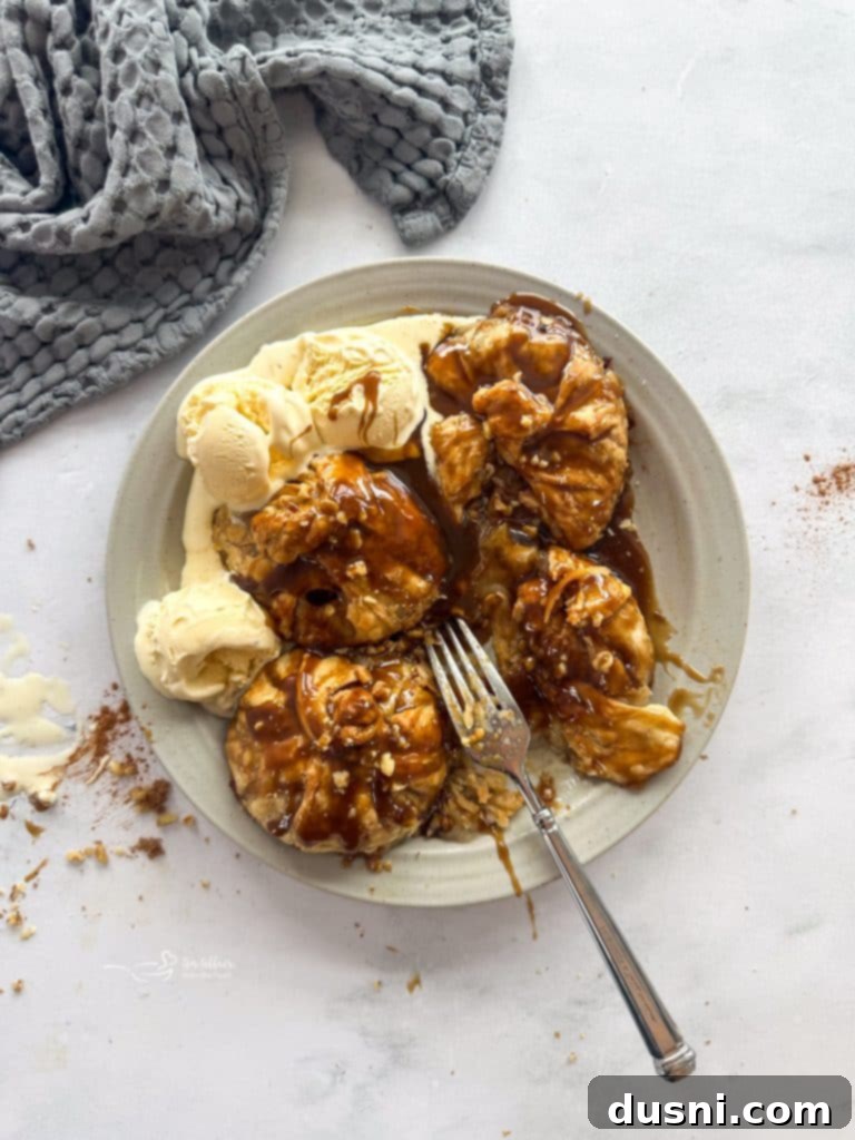 Pinterest Pin: Apple Dumplings with Spiced Rum Caramel Sauce