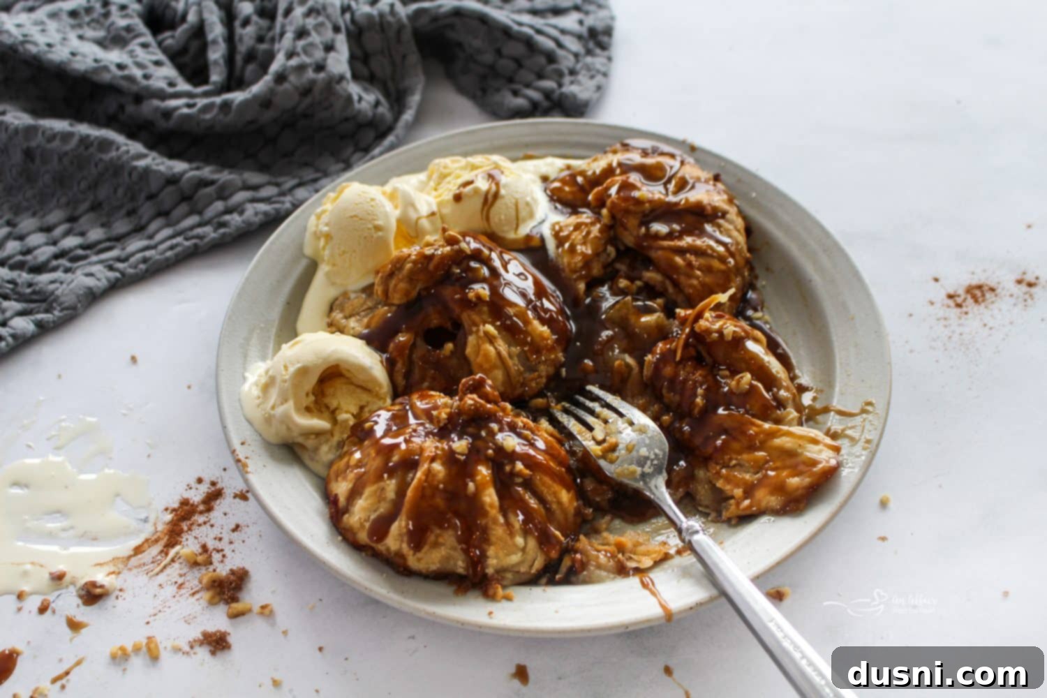 Close-up of Apple Dumplings on a Plate with Sauce