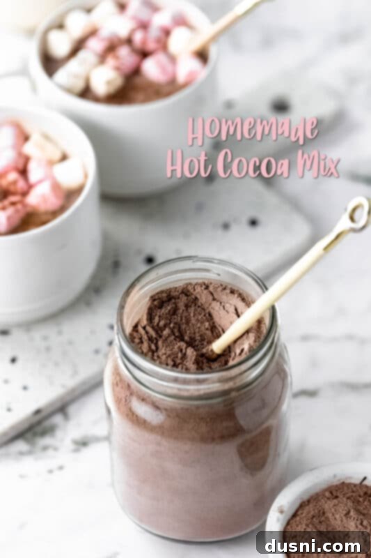 Cozy Homemade Cocoa Blend 15 A mason jar of homemade hot cocoa mix tied with a rustic string, perfect for gifting.