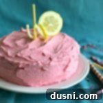 Blush Citrus Dream 15 Pink Lemonade Cake on a white serving plate