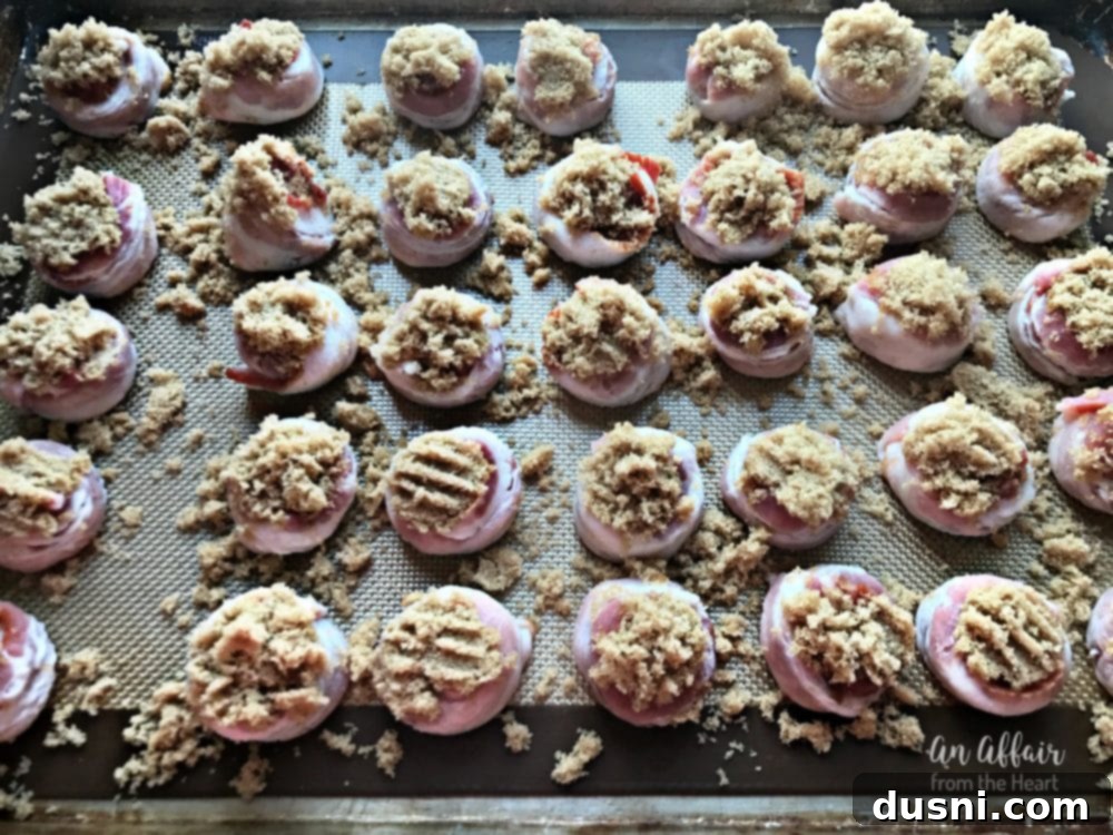 Aloha Bacon Wrapped Sausage Poppers 10 Brown sugar being sprinkled over bacon-wrapped sausage bites