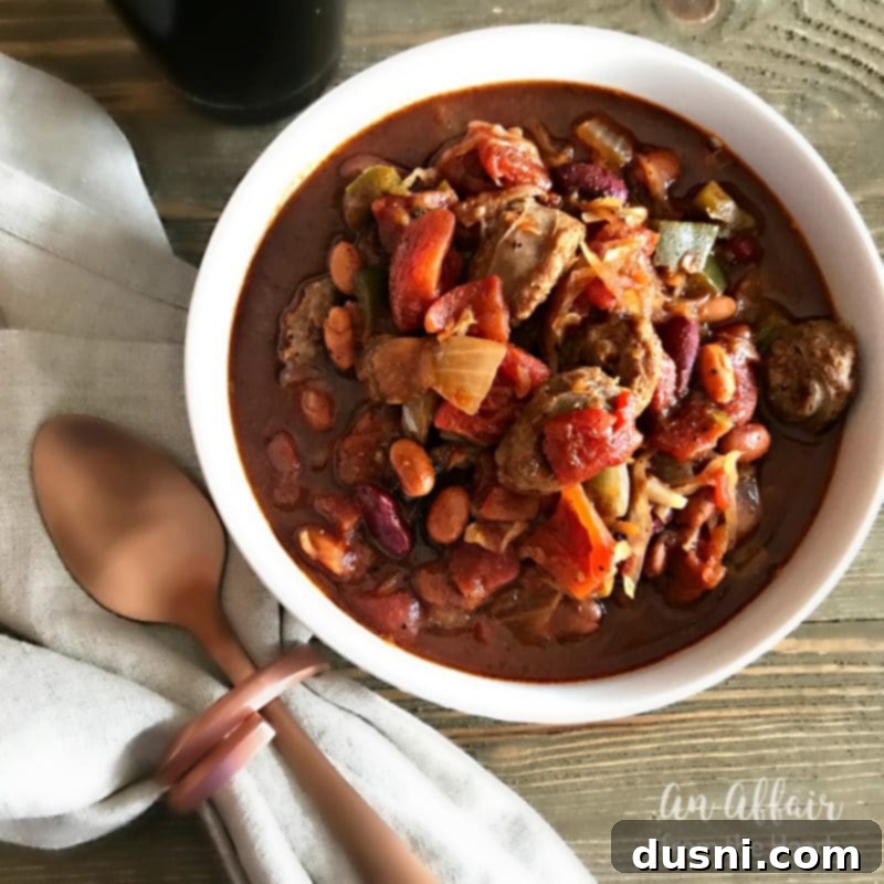 Oktoberfest Beer Chili 7 Oktoberfest Chili in a white bowl with bread