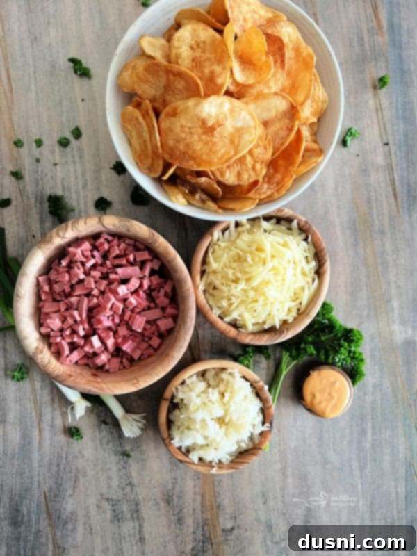 Loaded Reuben Nachos 4 A full sheet pan of Reuben Nachos ready to be served, showcasing the rich colors and textures of the toppings