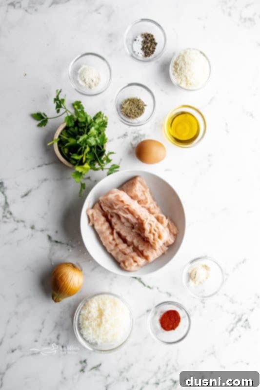 Crispy Air Fryer Turkey Meatballs 5 Mixed ingredients for turkey meatballs in a bowl.