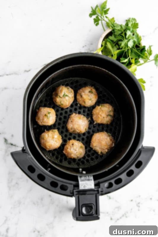 Crispy Air Fryer Turkey Meatballs 9 Scooping the meatball mixture.
