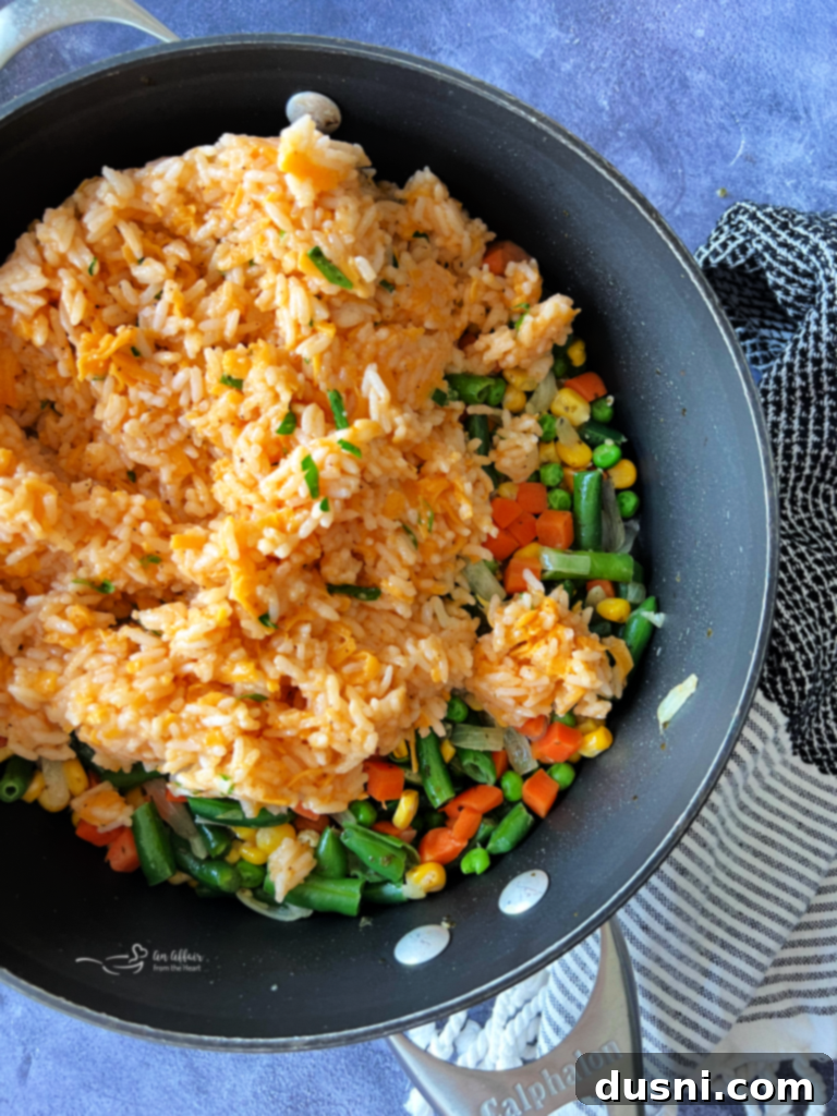 Dorothy's Golden Cheesy Vegetable Rice Bake 11 Rice mixed with vegetables and cheese.