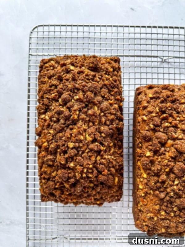 Pumpkin Patch Zucchini Crumble Loaf 13 Pumpkin Zucchini Streusel Bread cooling on a wire rack after baking.