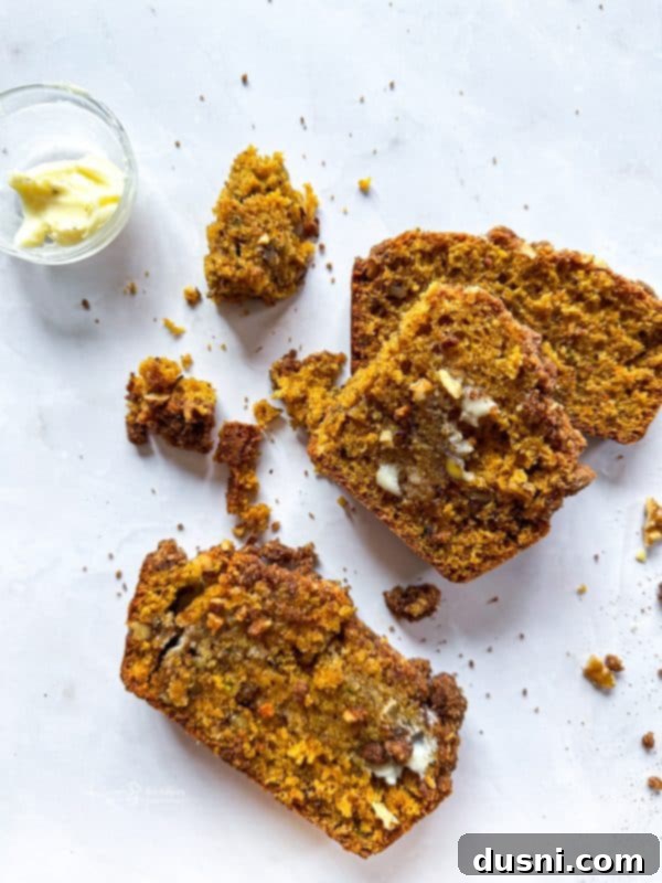 Pumpkin Patch Zucchini Crumble Loaf 3 Two loaves of Pumpkin Zucchini Streusel Bread cooling on a wire rack.