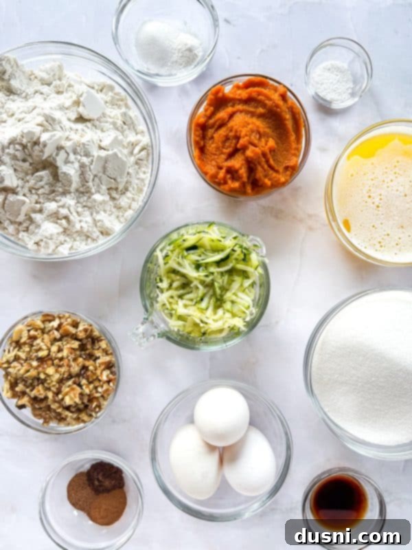 Pumpkin Patch Zucchini Crumble Loaf 6 A freshly baked loaf of Pumpkin Zucchini Streusel Bread, still in the loaf pan.