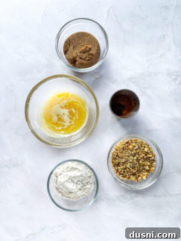 Pumpkin Patch Zucchini Crumble Loaf 7 Ingredients for Pumpkin Zucchini Streusel Bread laid out.