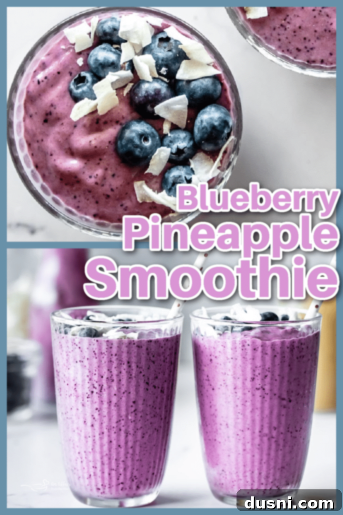 Vibrant Blueberry Pineapple Refresher 7 A tall glass of Blueberry Pineapple Smoothie with a metal straw, against a light background.