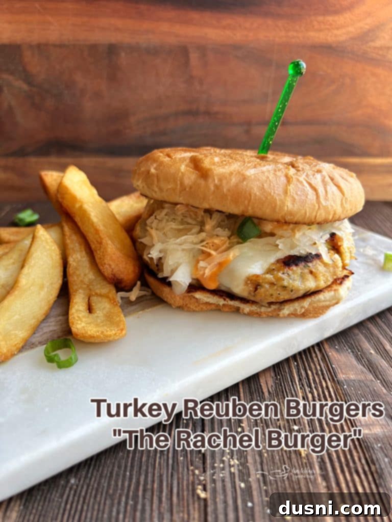 A vibrant hero shot of a Turkey Reuben Burger, ready to be enjoyed.