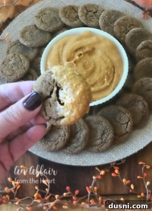 Warm Spiced Cookies with Creamy Pumpkin Dip 10 Pile of Spice Cookies with Pumpkin Dip in a bowl