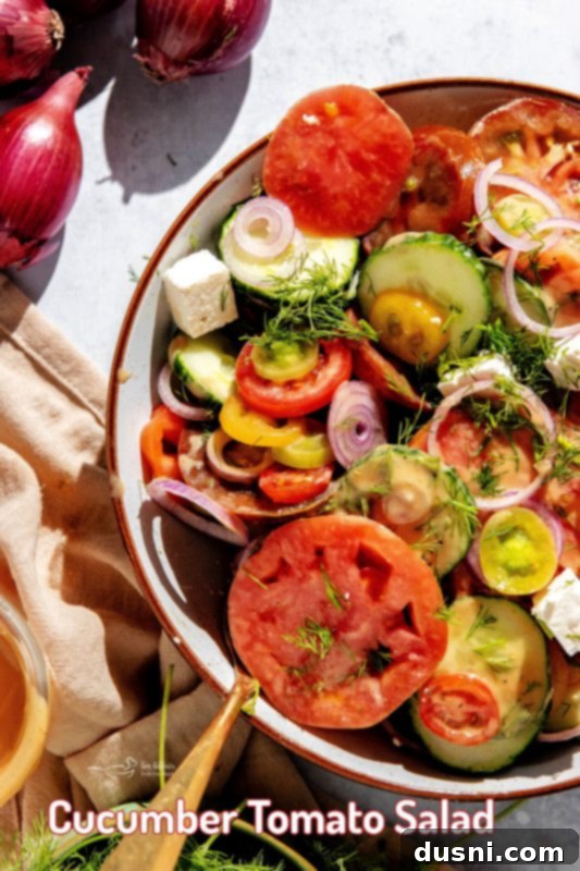 Refreshing Cucumber Tomato Salad 13 A beautiful, close-up shot of a prepared Cucumber Tomato Salad, showcasing its vibrant colors.