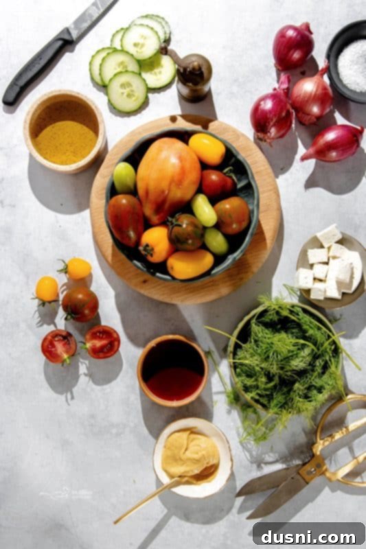 Refreshing Cucumber Tomato Salad 5 A bowl of fresh Cucumber Tomato Salad, ready to be dressed.