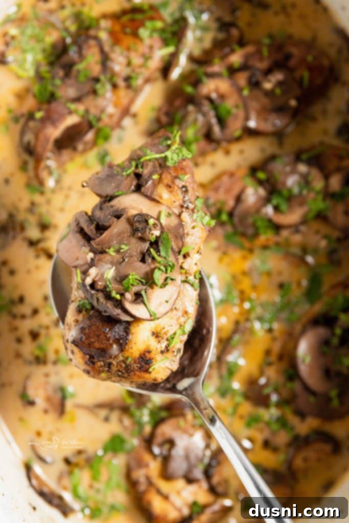Effortless Slow Cooker Chicken Marsala 2 Crock Pot Chicken Marsala served in a bowl with fresh parsley