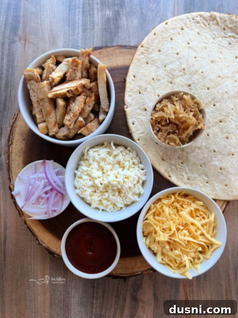 Whole grilled BBQ chicken pizza, hot and fresh from the grill, ready to be sliced.