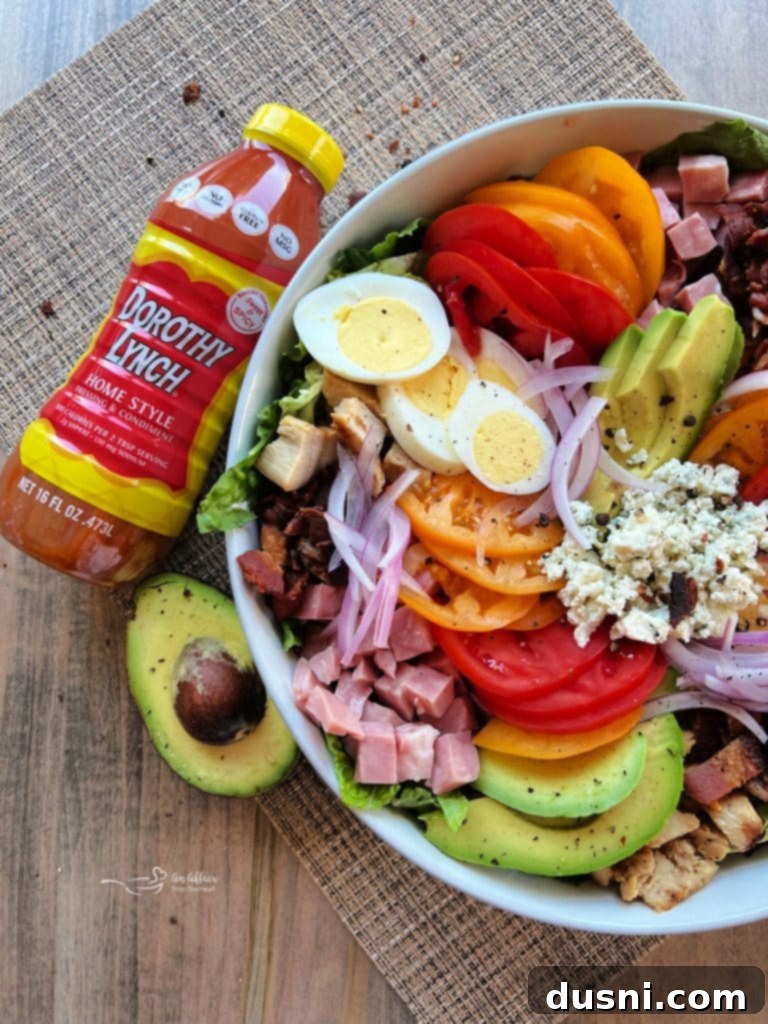 Summer's Crisp Cobb 12 A collection of salad ingredients, beautifully fresh and ready for preparation.