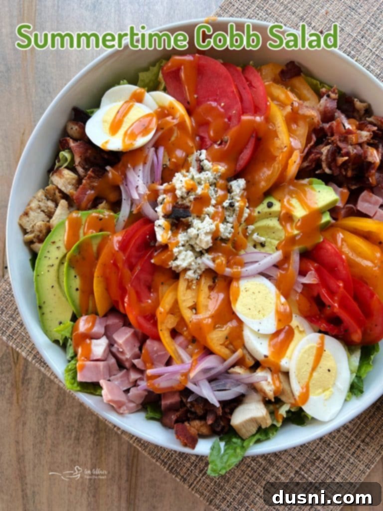 Summer's Crisp Cobb 14 A vibrant and colorful Summertime Cobb Salad, ready to be enjoyed.