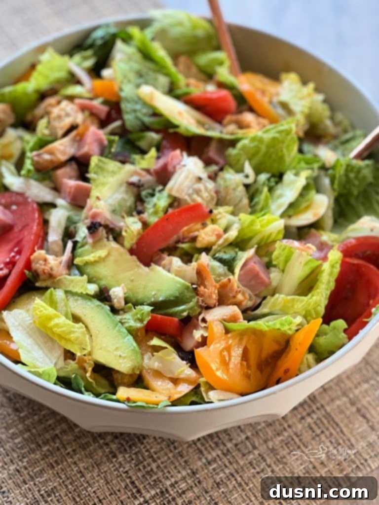 Summer's Crisp Cobb 7 Summertime Cobb Salad, fully dressed with Dorothy Lynch and ready to serve.