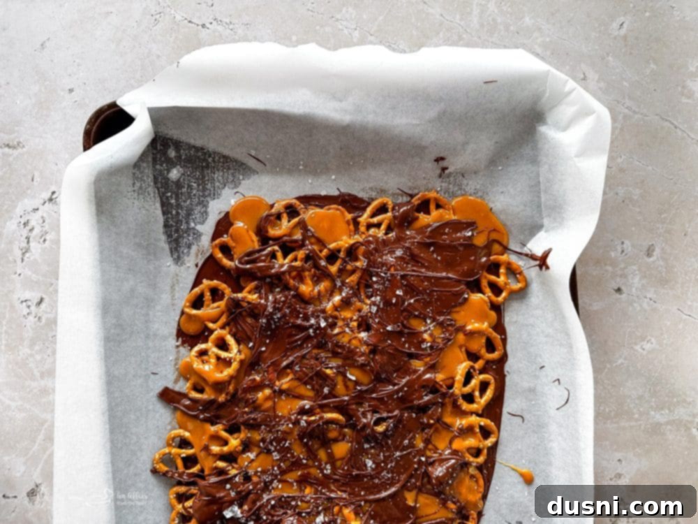 Sweet Salty Chocolate Pretzel Delight 11 Step 5: Drizzling chocolate and sprinkling sea salt