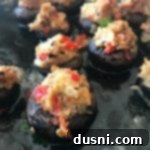 Creamy Surimi Stuffed Mushrooms 13 Close up of Seafood Stuffed Mushrooms cooking