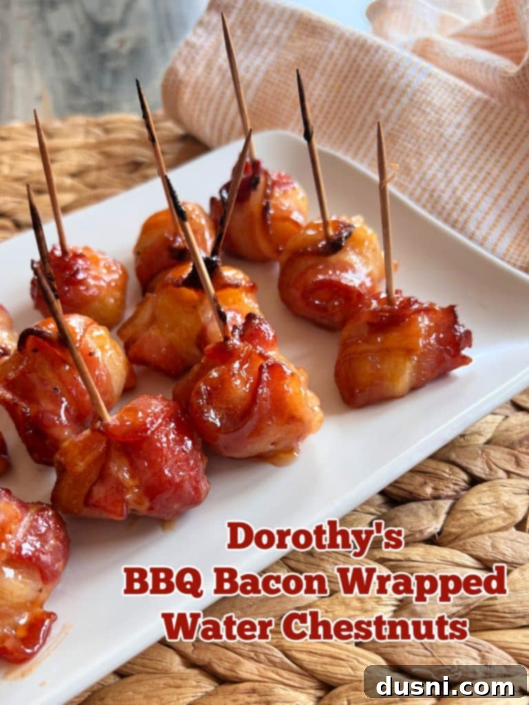 A plate of Dorothy Lynch BBQ Bacon Wrapped Water Chestnuts, ready for serving at a party.
