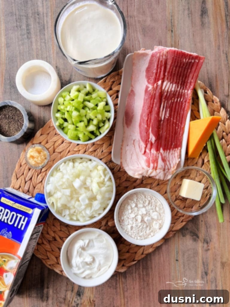 Rich and Velvety Bacon Soup 5 Creamy Bacon Soup in a rustic white bowl with a side of crusty bread.