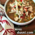 Hearty Italian Chicken Noodle Soup 12 Italian Chicken Noodle Soup in a white bowl