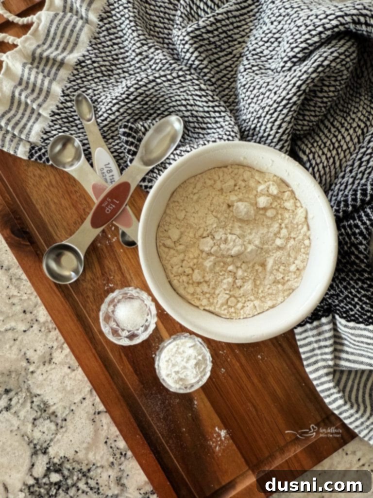 A close-up of a bowl filled with freshly made homemade self-rising flour, ready for baking.