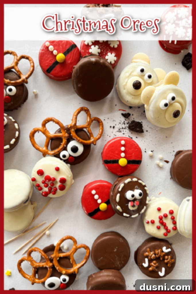 A festive array of chocolate-dipped Christmas Oreos, including Santa, reindeer, and polar bear designs, artfully arranged on a white backdrop.