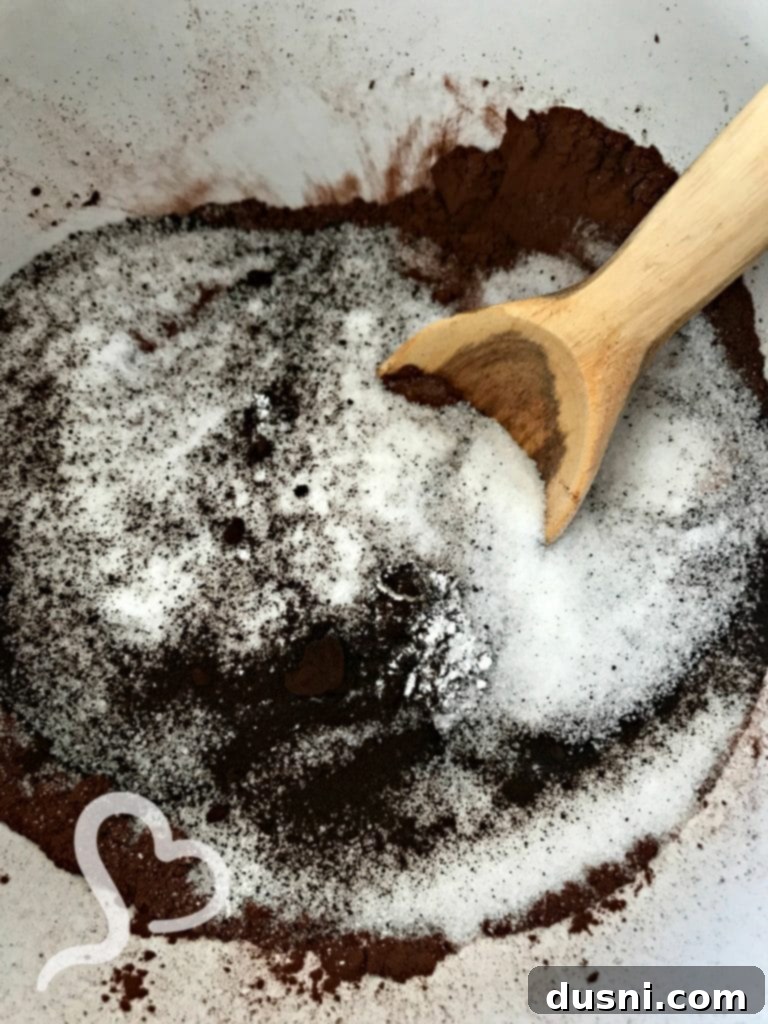 Brownie batter being mixed in a bowl