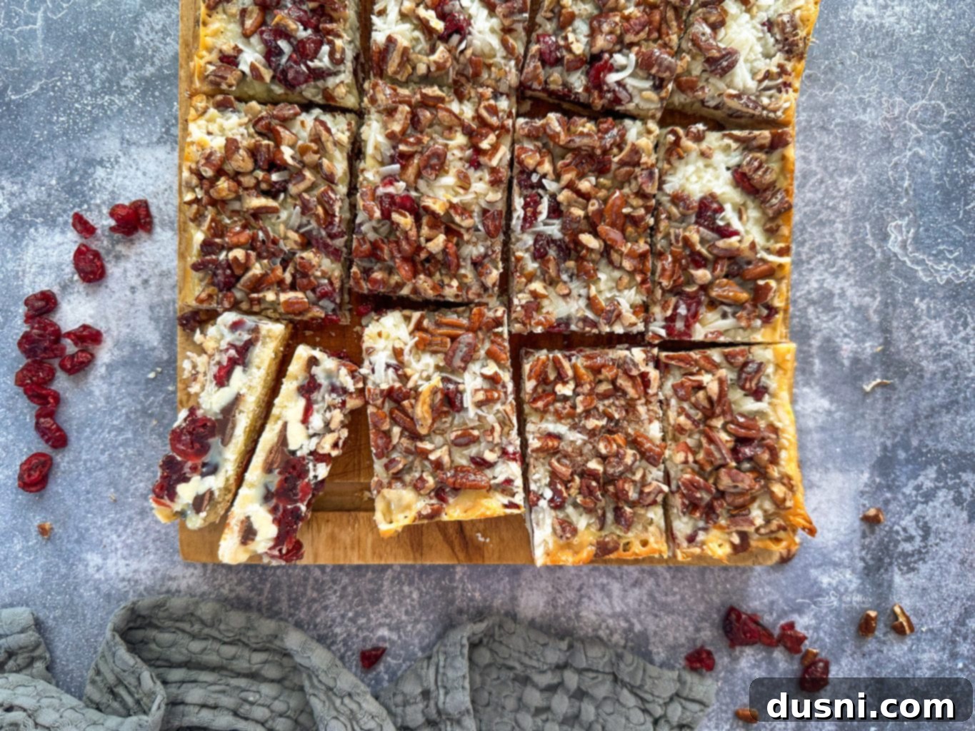 Crimson & Cacao Dream Bars 8 All layers of the Double Chocolate Cranberry Magic Bars assembled in the baking dish before baking.