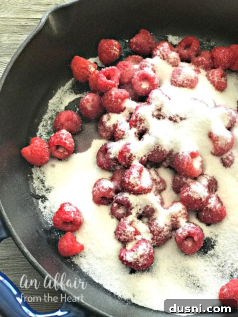 Raspberries and Sugar in a Pan for Sauce