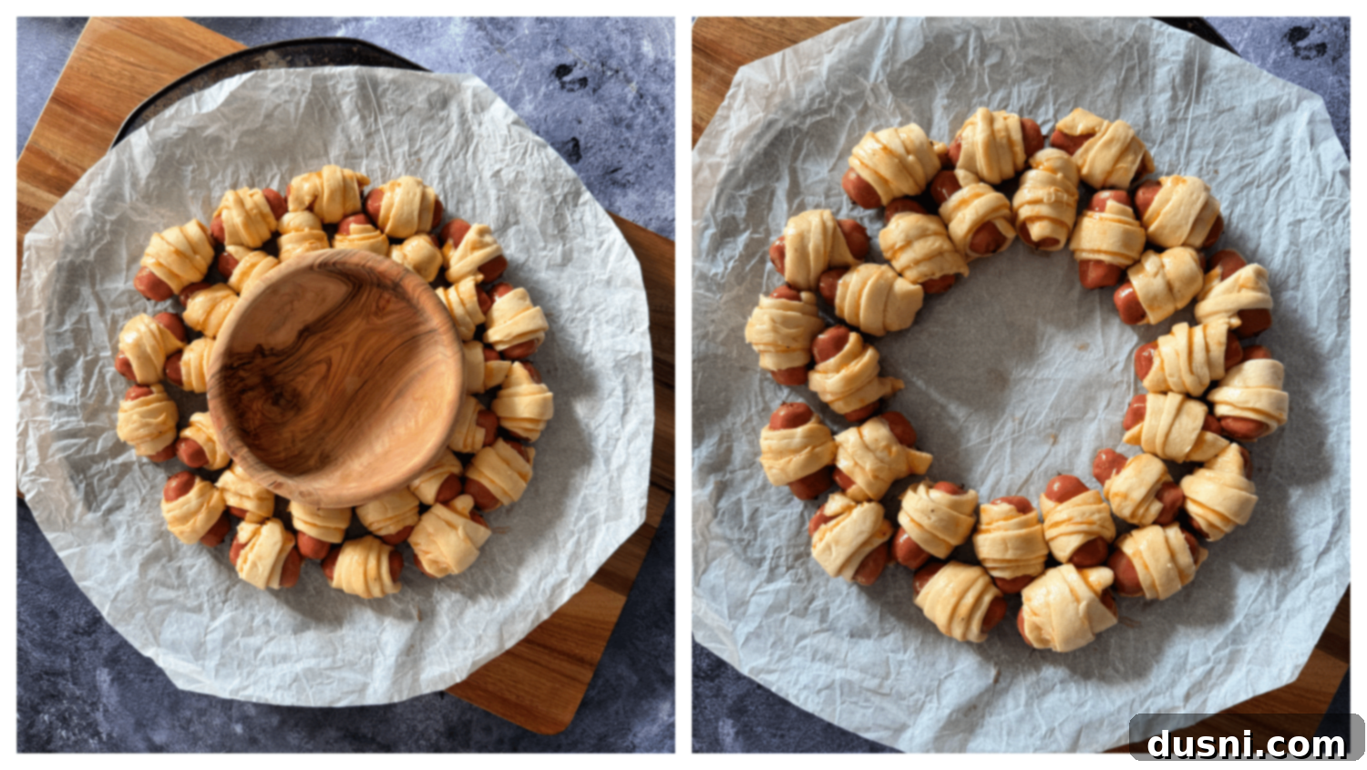 Pull-Apart Pigs in a Blanket Wreath 9 Wrapped sausages carefully arranged in a circular wreath pattern on a parchment-lined baking sheet.