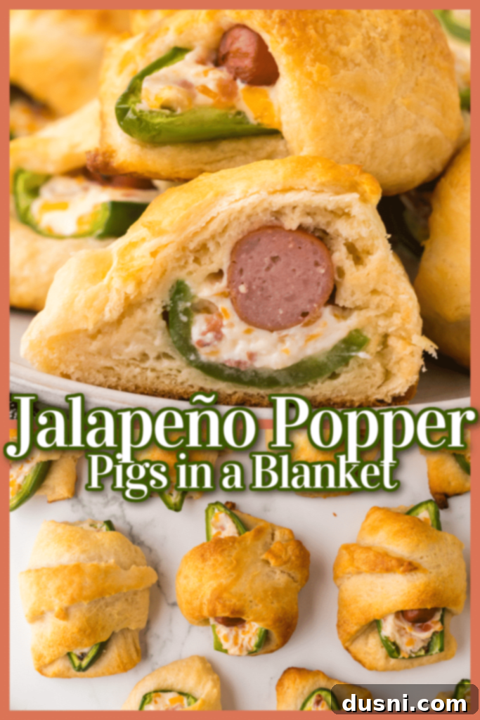 A person holding a freshly baked Jalapeño Popper Pig in a Blanket, with a plate full of more in the background.