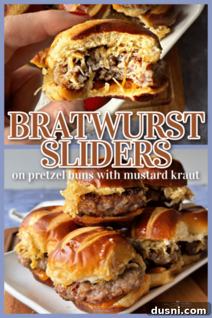 Close-up of a single Bratwurst Slider, showcasing the melted cheese, kraut, and pretzel bun.