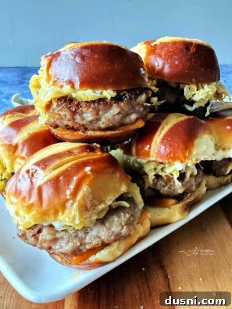 A tray of freshly baked Bratwurst Sliders cooling down, ready for serving.
