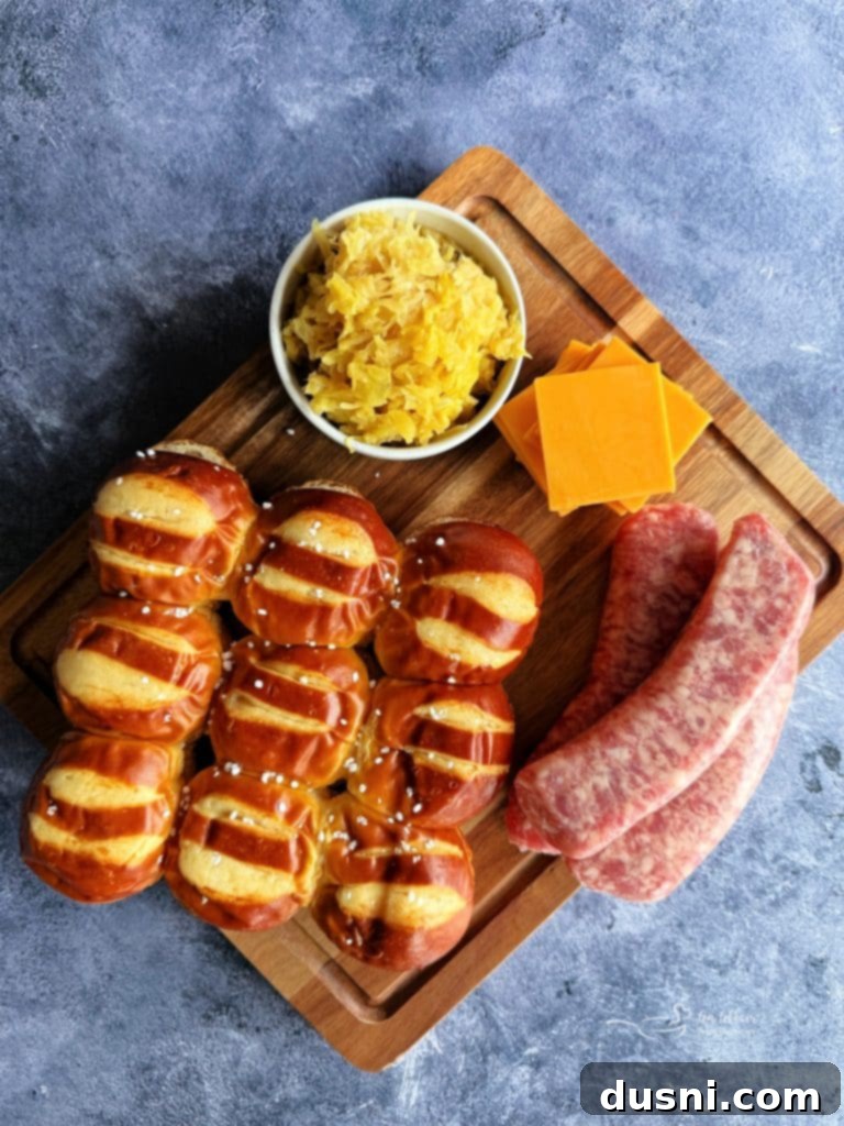 Finished Bratwurst Sliders plated beautifully, showing the golden pretzel buns and juicy filling.