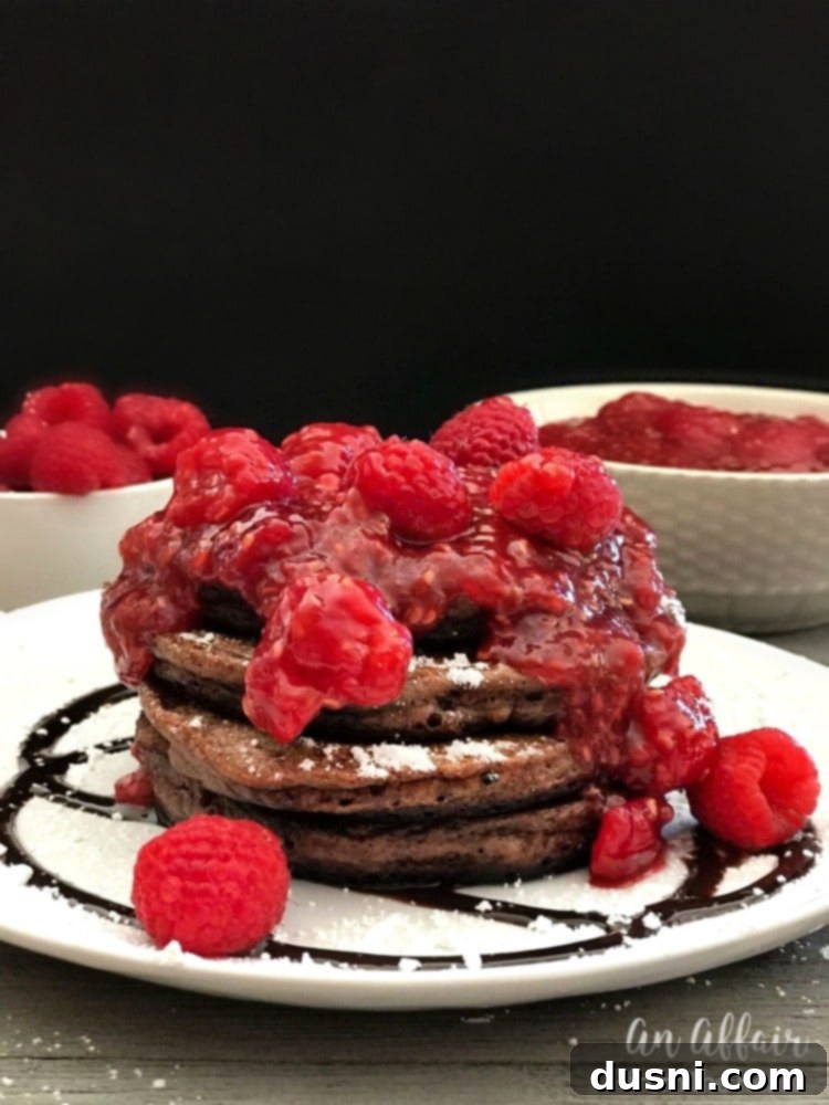 Fluffy Chocolate Pancakes with Homemade Raspberry Sauce