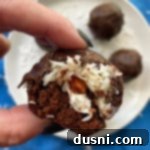 Coconut Almond Brownie Bites 11 Almond Joy Brownie Bites missing a bite