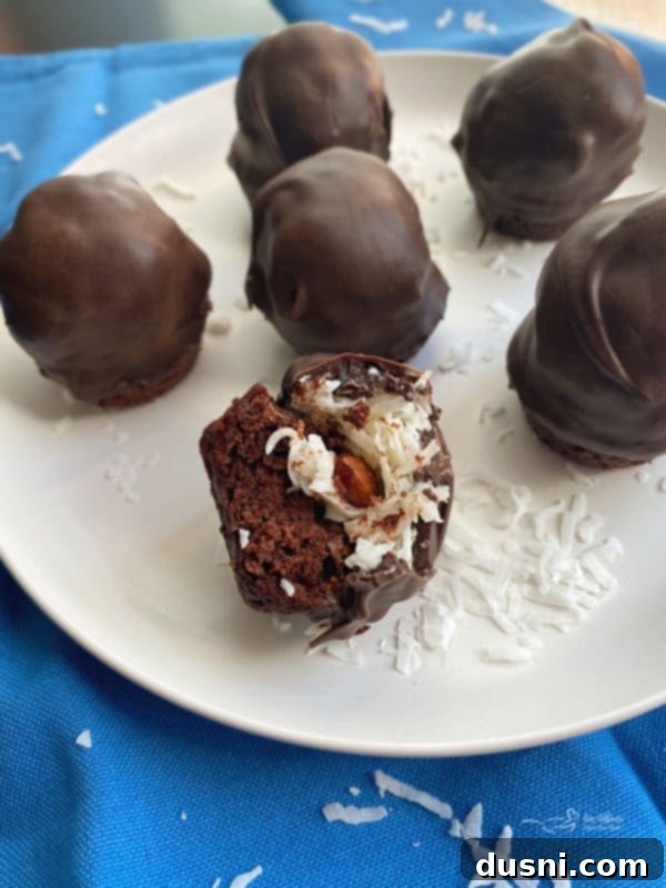 Coconut Almond Brownie Bites 3 Close-up of Almond Joy Brownie Bites, showing the fudgy texture and coconut topping