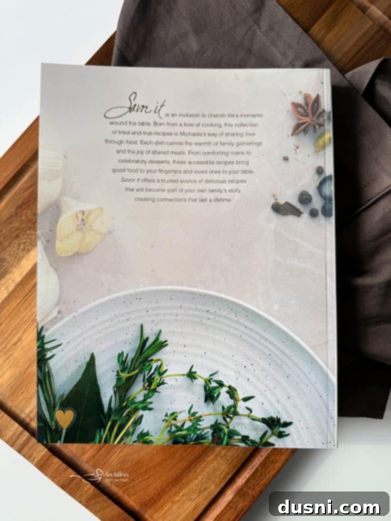 Open Savor It cookbook on a kitchen counter, showcasing a delicious recipe page.